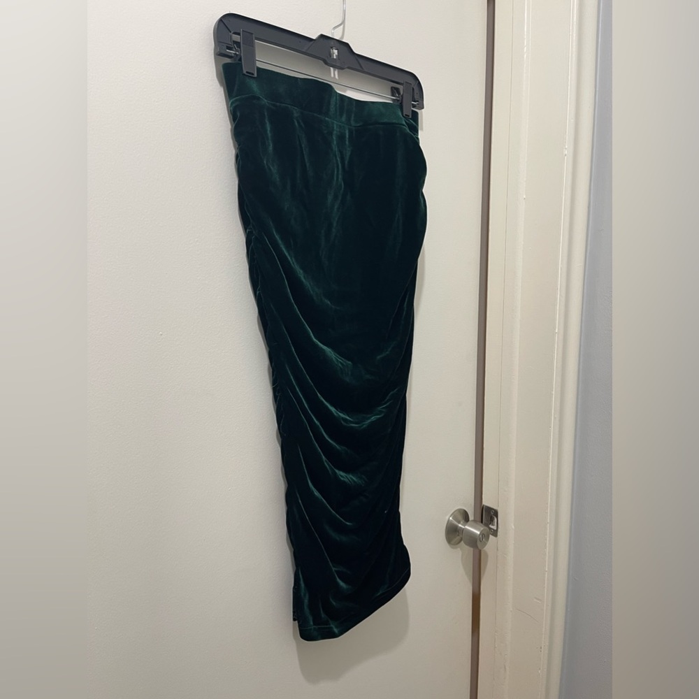 Velvet emerald green skirt. Sides are touched and very flattering.